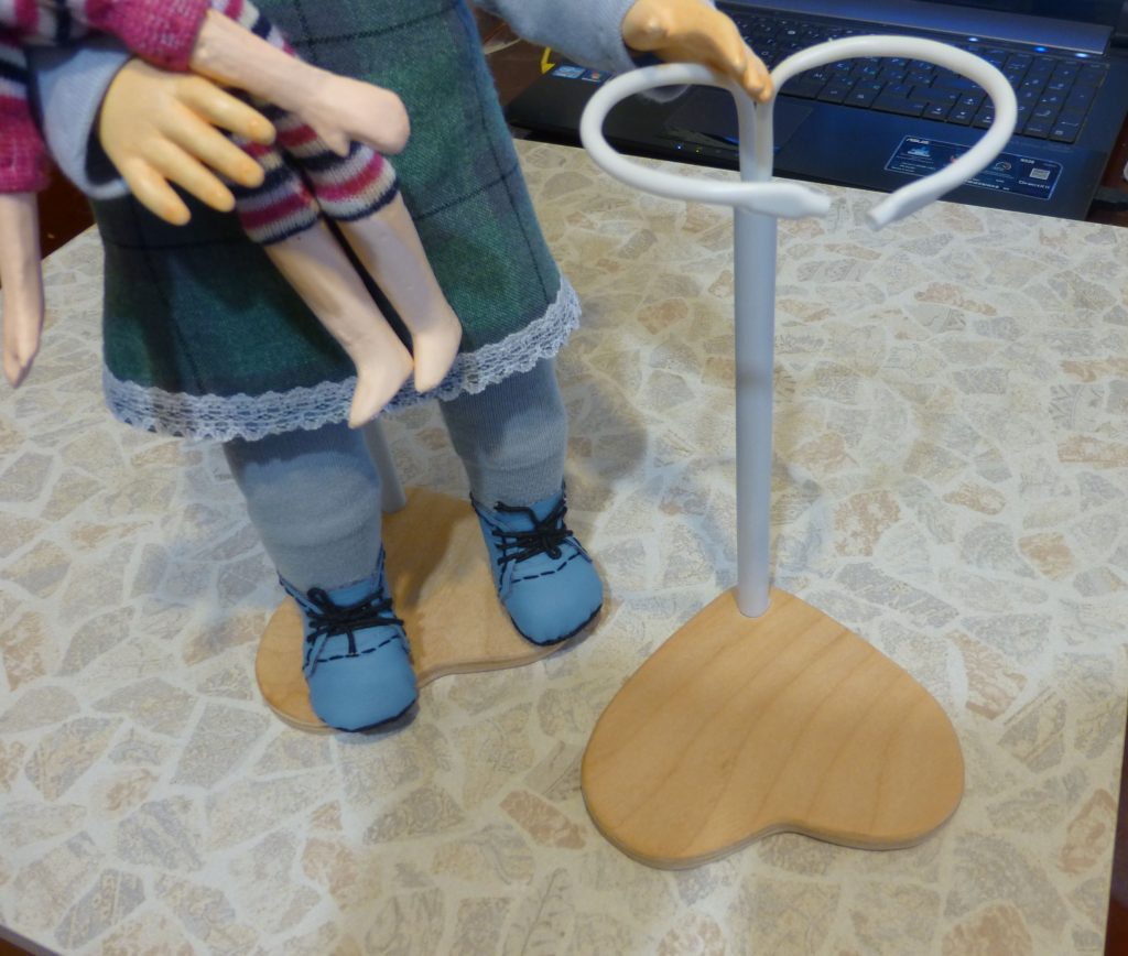 Stand-holder for the doll with his own hands